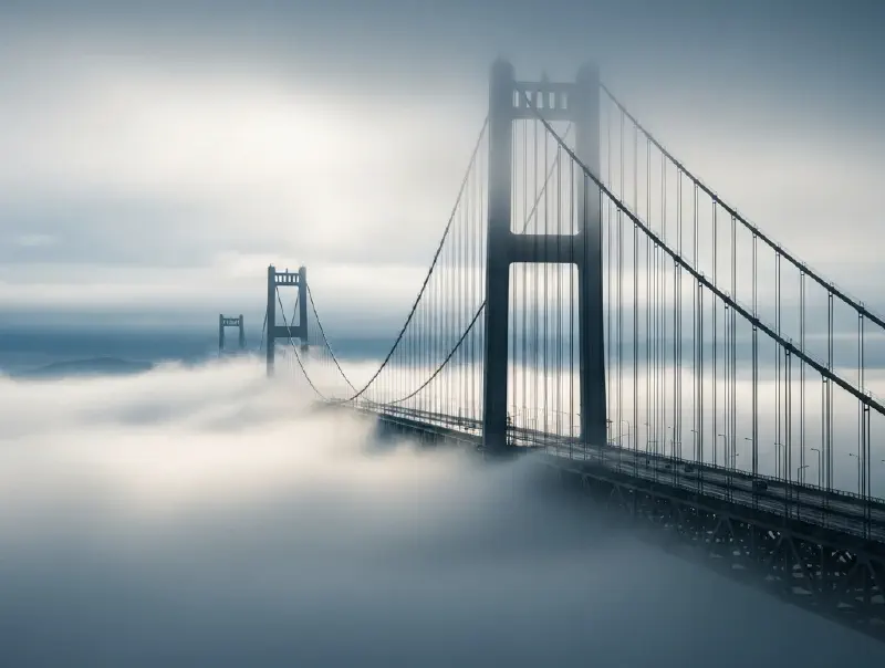 A partially obscured bridge symbolizing uncertainty and risk in design