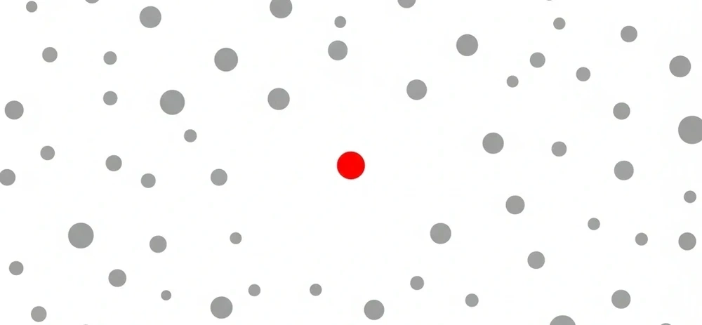 A single red circle standing out amongst numerous gray circles.